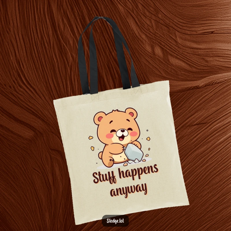 Funny Bear Tote Bag: A playful bear comically smashes a small object, perfect for funny, whimsical everyday use and carrying essentials.